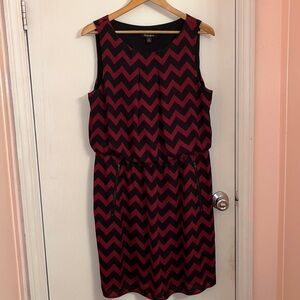 Deep red and black sleeveless dress with chevron pattern